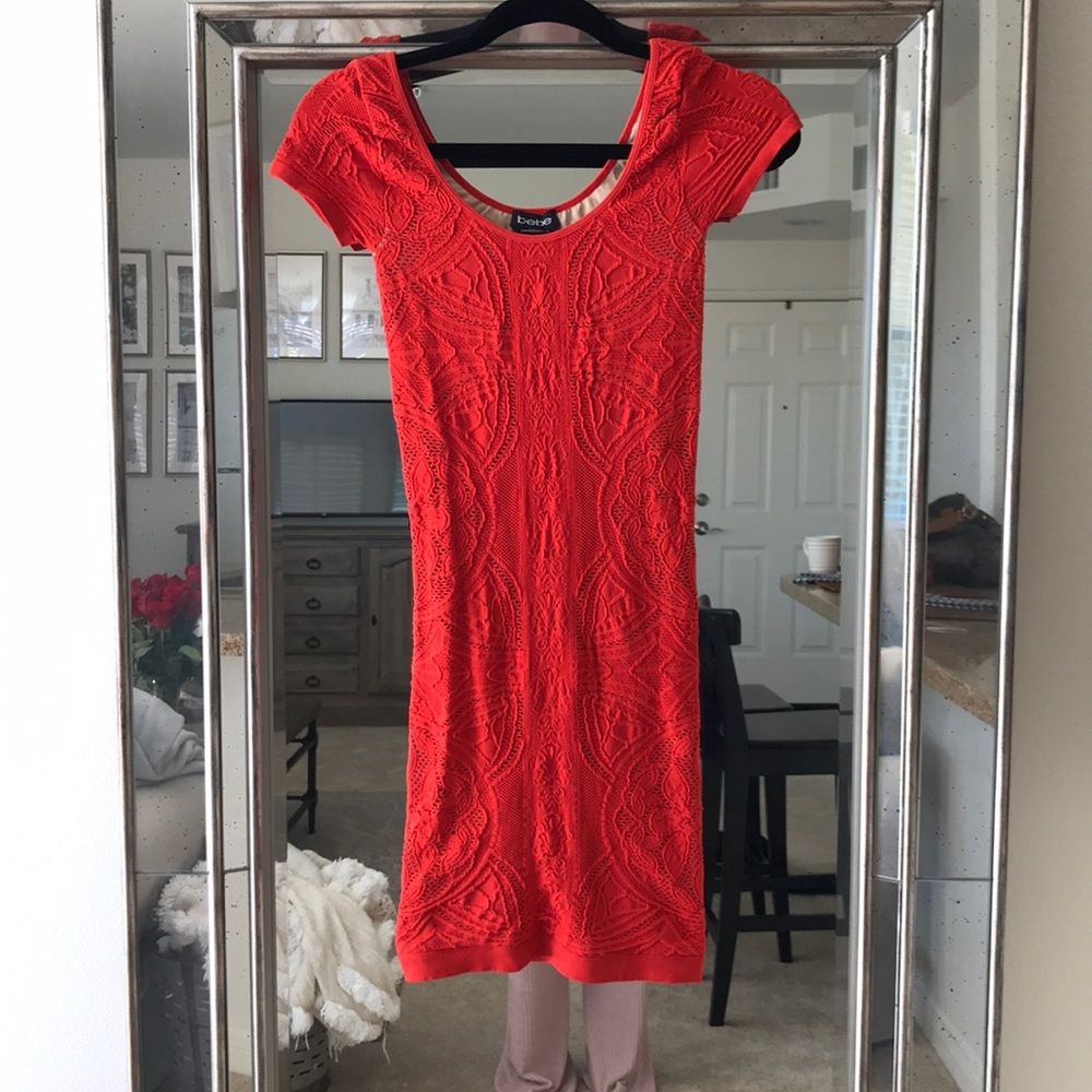Hot orange bodycon dress from Bebe